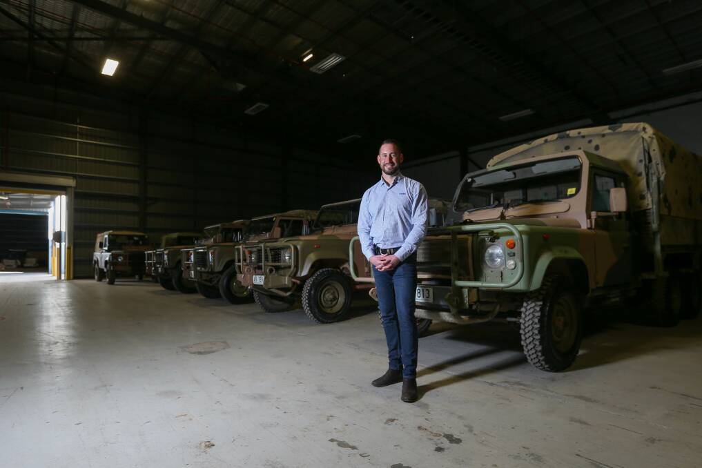 DRIVING FORCE: Pickles Auctions manager Richard White showcases some of the ex-military vehicles, which will be available at auction. Picture: TARA TREWHELLA