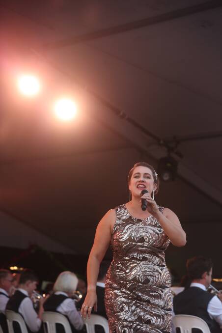 Emma Mancer sings It's Beginning to Look a Lot Like Christmas at the Wodonga Carols in 2019. The carols will be live-streamed this year. Picture: TARA TREWHELLA