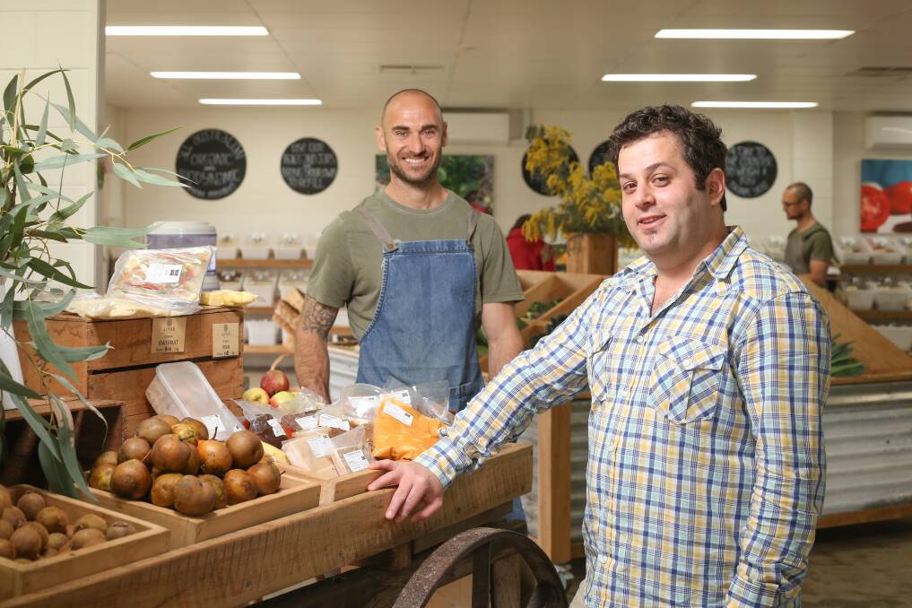 FARE EXCHANGE: Almar Organics co-owner Clint Hall and La Maison Restaurant and Bar co-owner Wassim Saliba offer the later's restaurant-made meals two days a week in South Albury now. Picture: JAMES WILTSHIRE