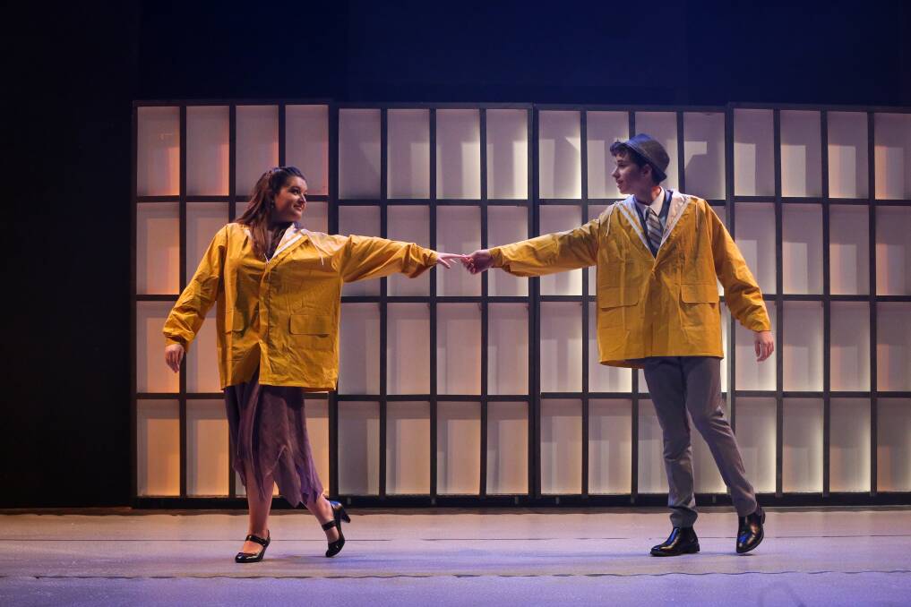ON SONG: Ellie Constable and Lochlan Moffat rehearse for Singin' in the Rain, opening in Albury tonight. Picture: JAMES WILTSHIRE