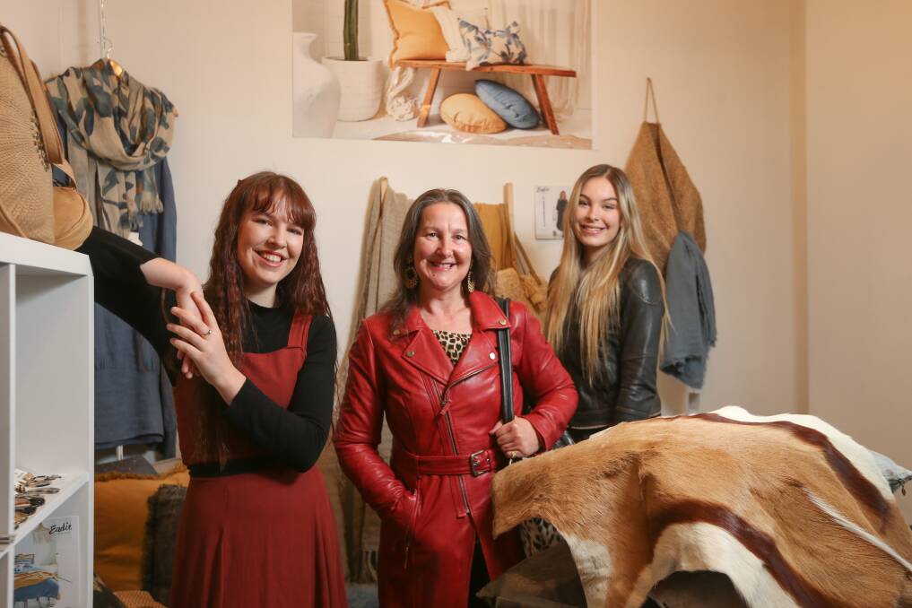 SILVER LININGS: Wodonga-based Carmen Wade, with her daughters Chloe and Bronte at Pure Hide in Albury, says buyers are becoming much more aware about sustainability and country of origin labelling. Picture: JAMES WILTSHIRE