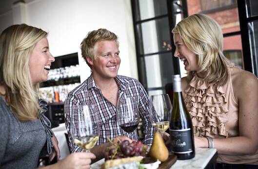 TOP LIST: All Saints Estate's Nick Brown, pictured with Eliza and Angela Brown, recognised by Gourmet Traveller Wine Australia for two wine lists among the state's best. 