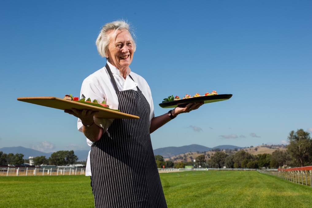 COURSES AMID HORSES: Fiona Landy Catering's team of 30 fed 260 people in the official marquee, scores in corporate marquees and hundreds on the barbecue.