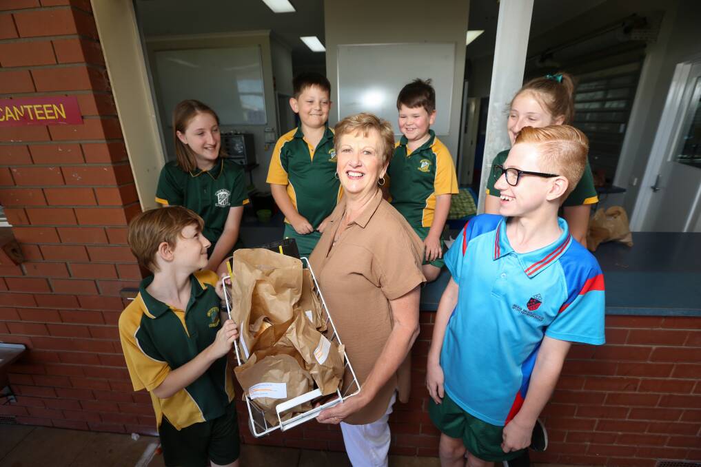 LUNCH LADY: St Patrick's Parish School - Albury tuck shop co-ordinator Anne Phegan is retiring from the role after a four-decade-long association with the canteen dating back to her children's school days. Picture: JAMES WILTSHIRE