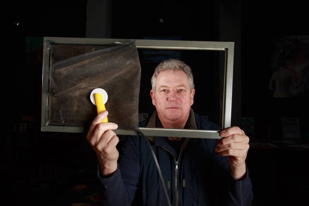 WIRED UP: Volunteer Wolfgang Huber will teach techniques for creating a professional finish on both wooden and aluminium-framed fly screens. Picture: SIMON BAYLISS