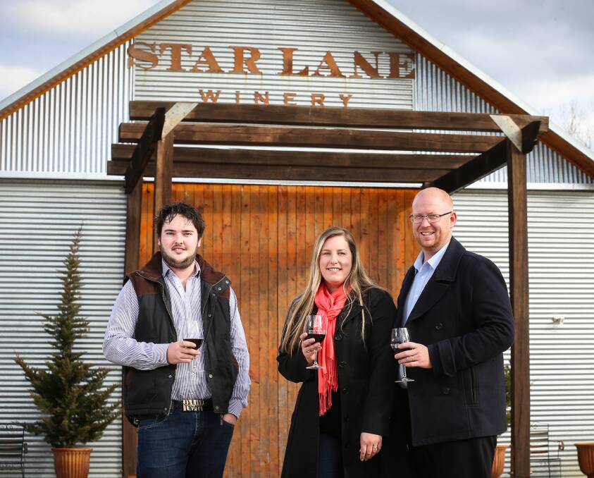 FOOD MILES: Star Lane Winery operation manager Ryan Barnes with Border-based More Than Food operators Lisa and John Gibbons ahead of the first spring tour to Beechworth at the weekend. Picture: JAMES WILTSHIRE