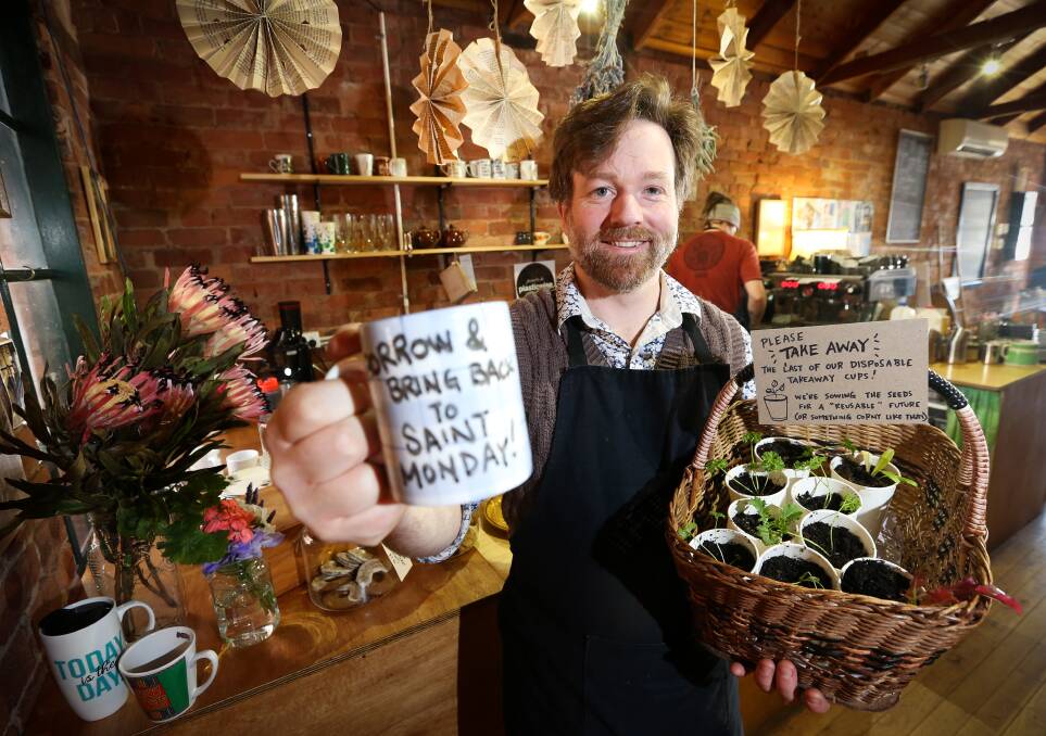 MUG SHOT: Saint Monday co-owner Chris McGorlick welcomes patrons who want to borrow a ceramic mug from their mug library after they ditched disposable coffee takeaway cups mid-week. Picture: KYLIE ESLER