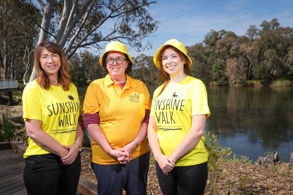 Albury mayor Kylie King, Albury Wodonga Regional Cancer Centre Trust Fund board member Di Thomas and Sunshine Walk participant Simone McLees look forward to the return to the Murray River route this year. Picture by James Wiltshire