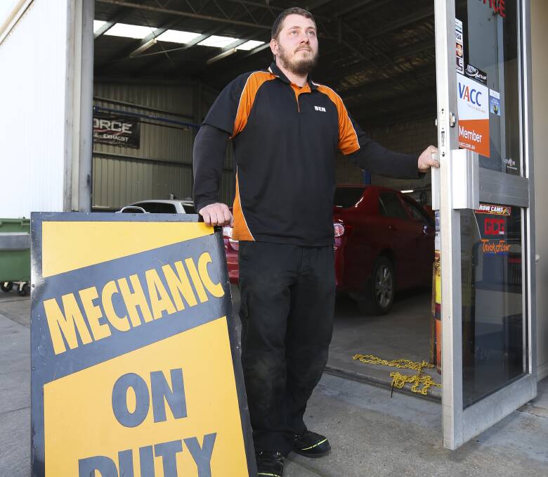 TUNED UP: Apprentice mechanic Ben Vicary finds his niche at Gricey's Workshop in Wodonga after changing careers. Mr Vicary suffered a back injury in his retail management job three years ago. Pictures: ELENOR TEDENBORG