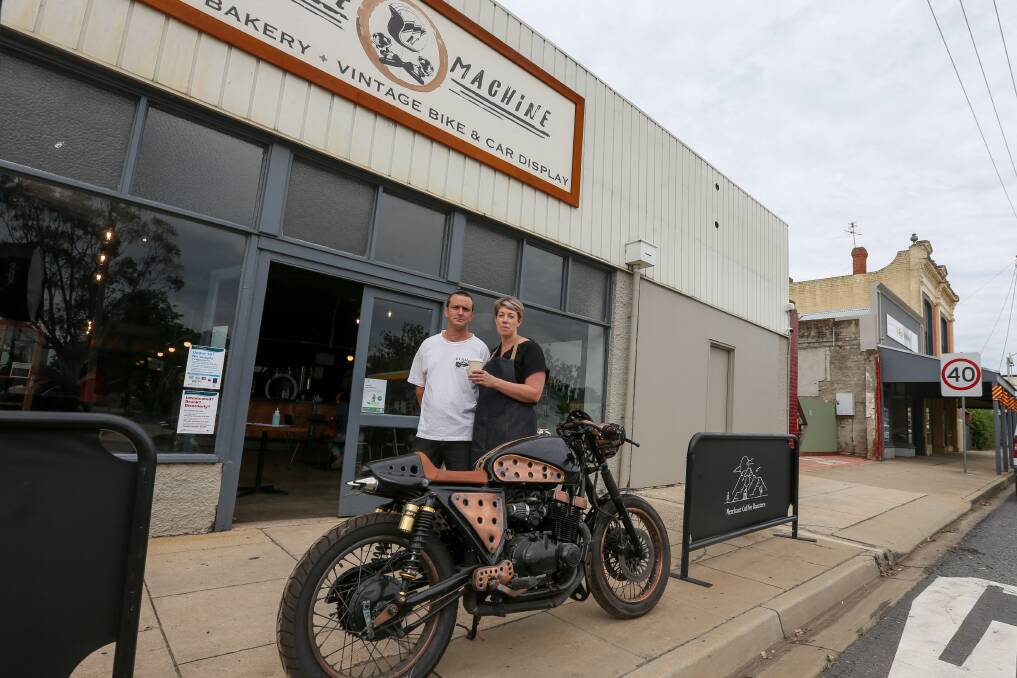 TICKET TO RIDE: Caffeine_n_machine co-owners Nick and Megan Hawtin have opened a cafe and vintage display. Picture: TARA TREWHELLA