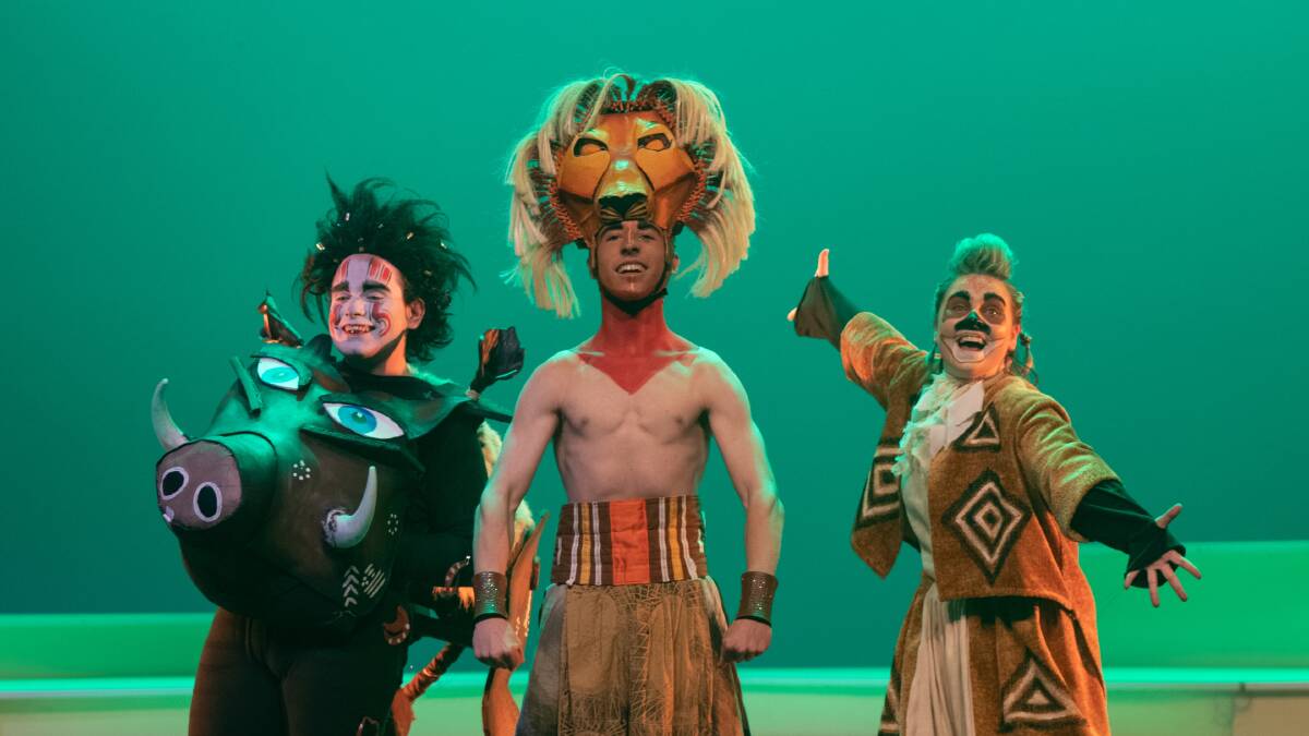 TRIPLE THREAT: The Lion King Jr cast members Stephen Phillips (Pumbaa), Rory Harrap (Simba) and Eliza Nichols (Timon) in the dress rehearsal. Picture: TARA TREWHELLA