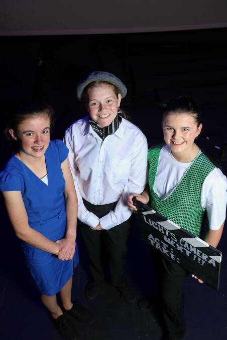 Cast members Brielle Pedler, 13, Lily McQualter, 16, and Matilda Walters, 11, rehearse for Albury Gang Show's Lights, Camera, Next!!! Picture: TARA TREWHELLA