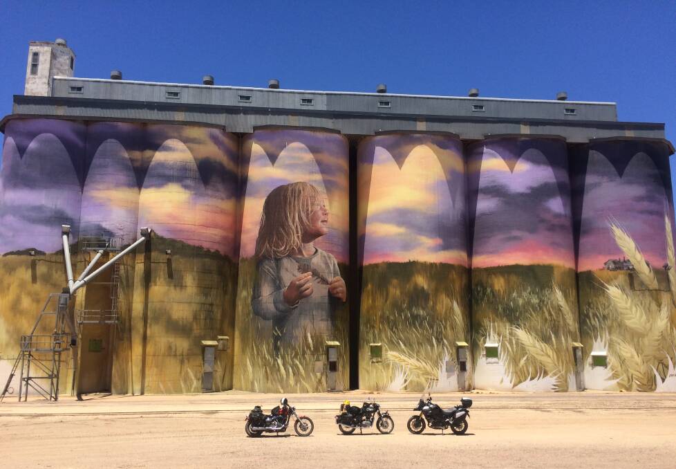 OUTBACK ART: The PAMS motocycles are dwarfed by Kimba Silos, South Australia, during the epic journey from Perth to Sydney and return.