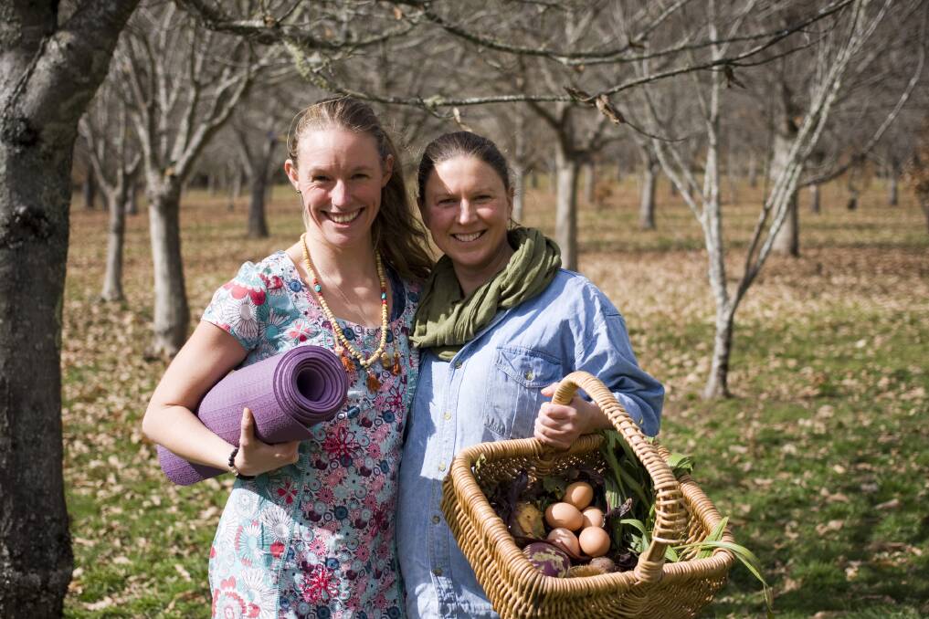 BALANCING ACT: Emily Rose, of Emily Rose Yoga, and Megan Hughes, of Wandiful Produce, will team up for Farm Connection: Journey to Wellbeing on Ms Hughes' family's organic nut farm in the Wandiligong Valley this spring.