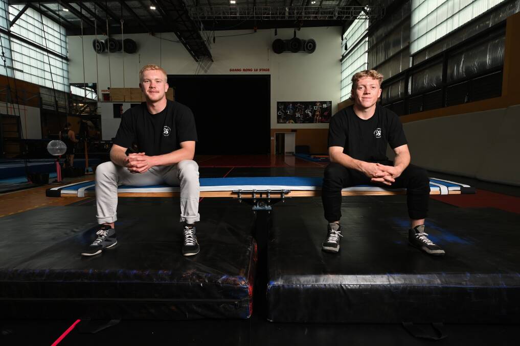 BALANCING ACT: Flying Fruit Fly Circus graduates Campbell Clarke, 19, and Tom Leask, 18, will join international circus company The 7 Fingers to take their teeterboard double act to the world. Picture: MARK JESSER