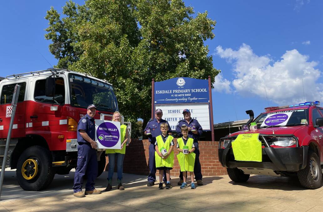 Good Friday Appeal area managers Jono Dower and Samantha Staley, brigade captains Stephen Lord and Mark Muldeary with Cooper Staley, 8, and Olly Dower, 7. 
