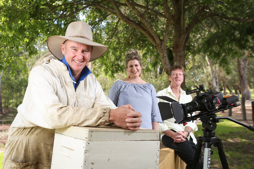 TEAM WORK: Mountainbee Honey founder Matthew Gledhill, Albury Wodonga Local Food Network coordinator Megan Hunt and Supergoat Media owner Paul Smith launch new homegrown documentary Einstein and the Upper Murray. Picture: JAMES WILTSHIRE