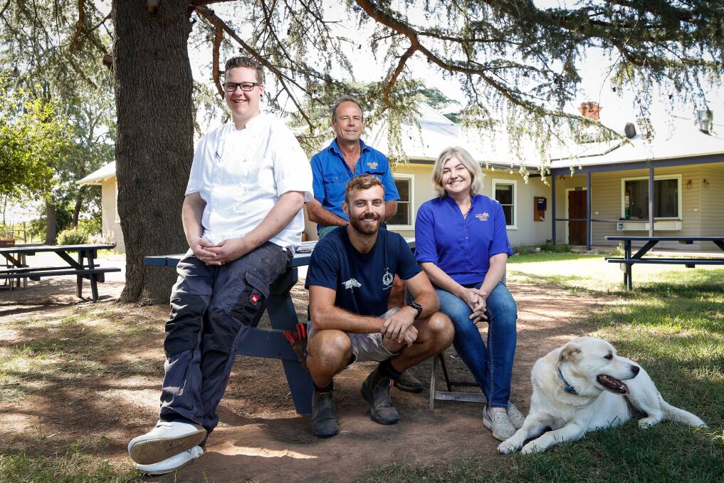 ON TRACK: (Clockwise, from left) New chef Jarrod Smith with Michael, Belinda and Joel Chambers and dog Riley. Picture: JAMES WILTSHIRE