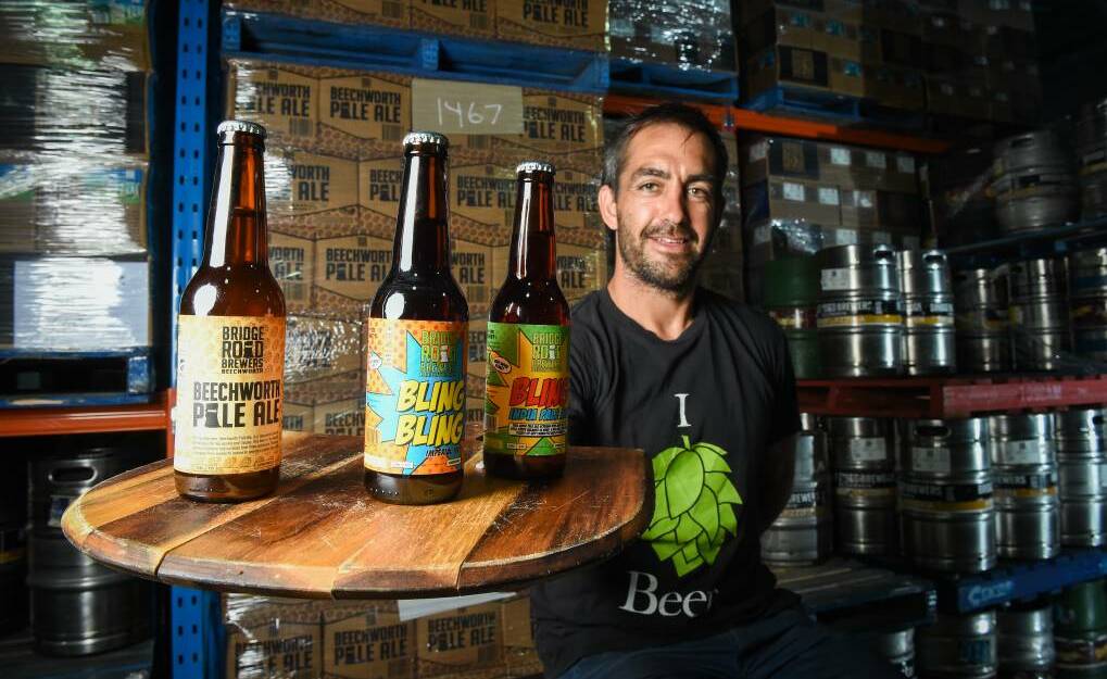 HERE'S CHEERS: Ben Kraus with some of the brewery's popular beers; the Pale Ale ranked sixth in the GABS Hottest 100 Aussie Craft Beers poll during 2019.
