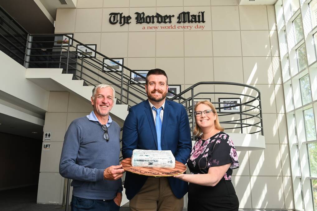 ACM managing director Tony Kendall, The Border Mail editor Xavier Mardling and The Border Mail advertising manager Jenny McPherson mark the 120th anniversary of the media company in Wodonga. Picture by Mark Jesser
