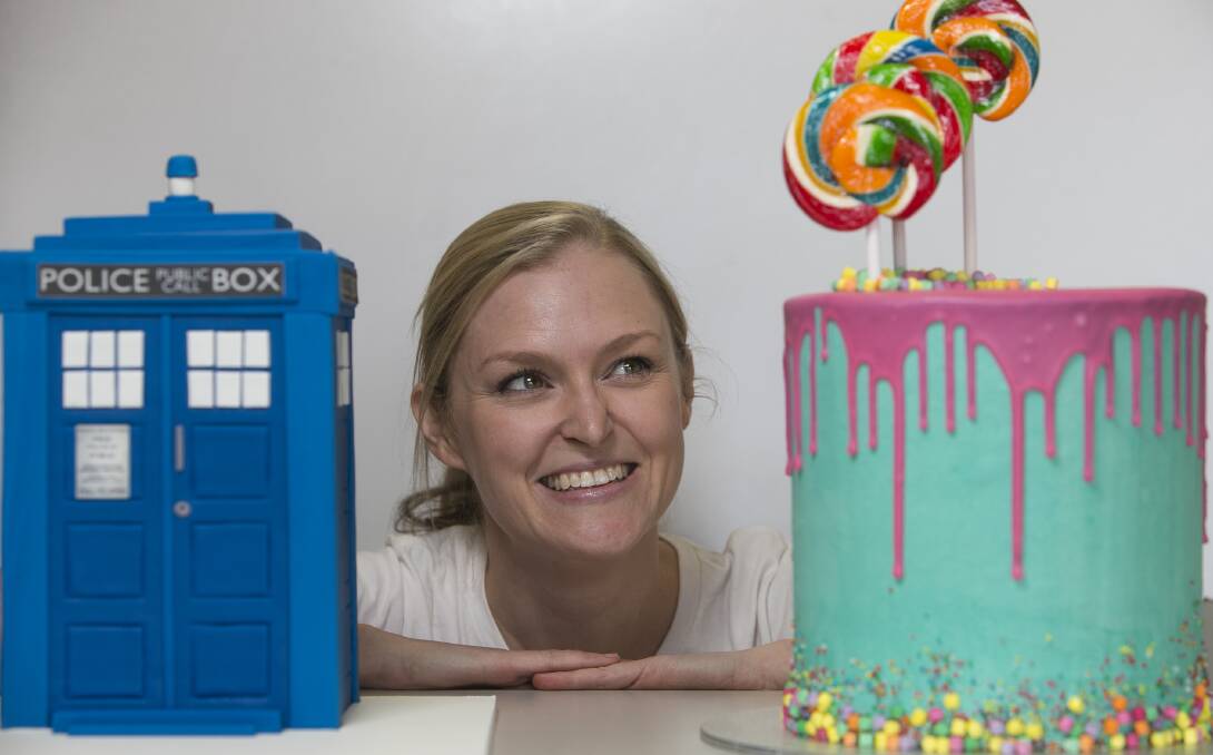 HIGHLY DECORATED: Miss Naked Cakes and Foods' Clare Doolan among her detailed handiwork at her Wodonga bakery. Picture: ELENOR TEDENBORG