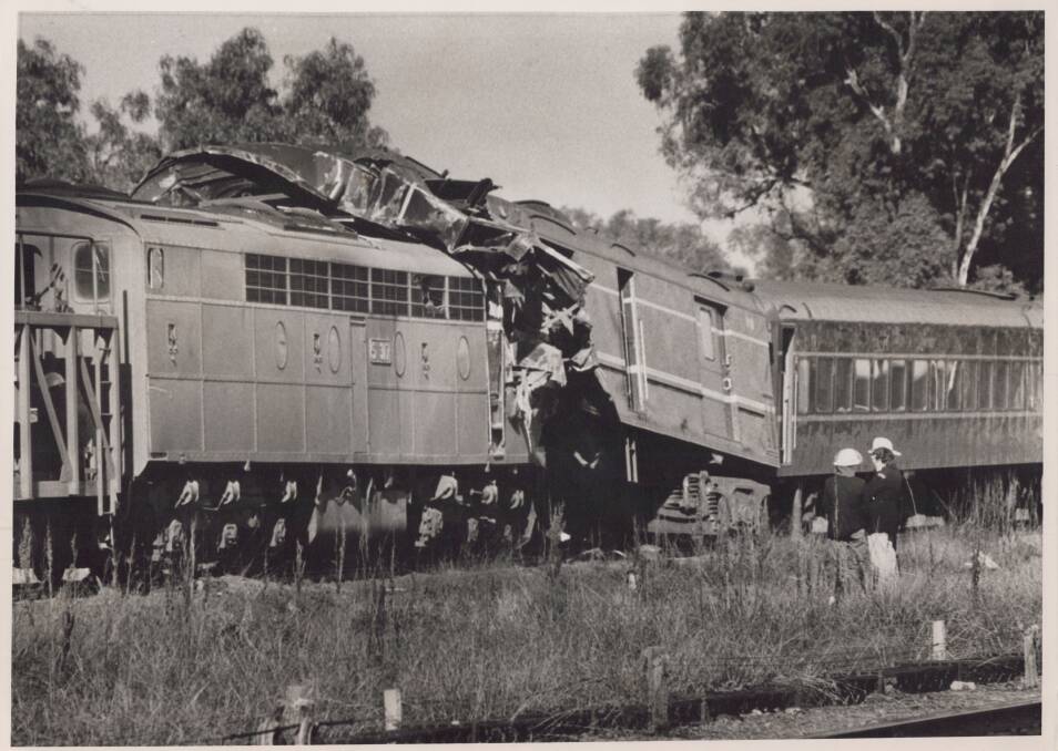 The crumpled wreckage of the goods train and the Spirit of Progress on June 17, 1982.
