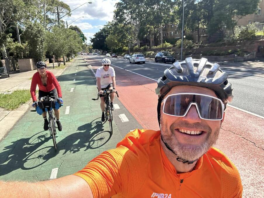 In a special moment, John Paine, who withdrew from the ride, joined Steve Muir and Dan Owen, front, to ride into the Sydney Opera House on Thursday afternoon. Picture supplied
