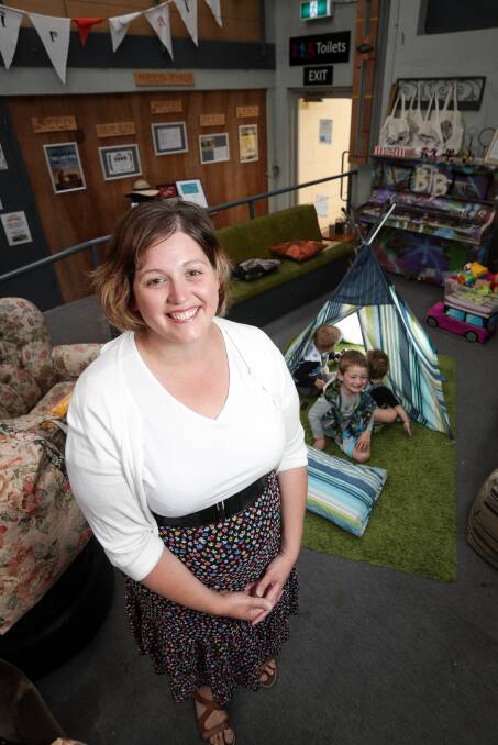 CHILD'S PLAY: Sewer Angela Maling with her children, Sidney, 1, Jude, 3, and Spencer, 5, in a tepee Angela made from a doona cover. A workshop will demonstrate upcycling textiles on Saturday. Picture: JAMES WILTSHIRE
