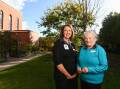 Mercy Health palliative care loss and grief support worker Michelle Enright and volunteer Anita Pickett in the established gardens at the Poole Street facility. Pictures: MARK JESSER