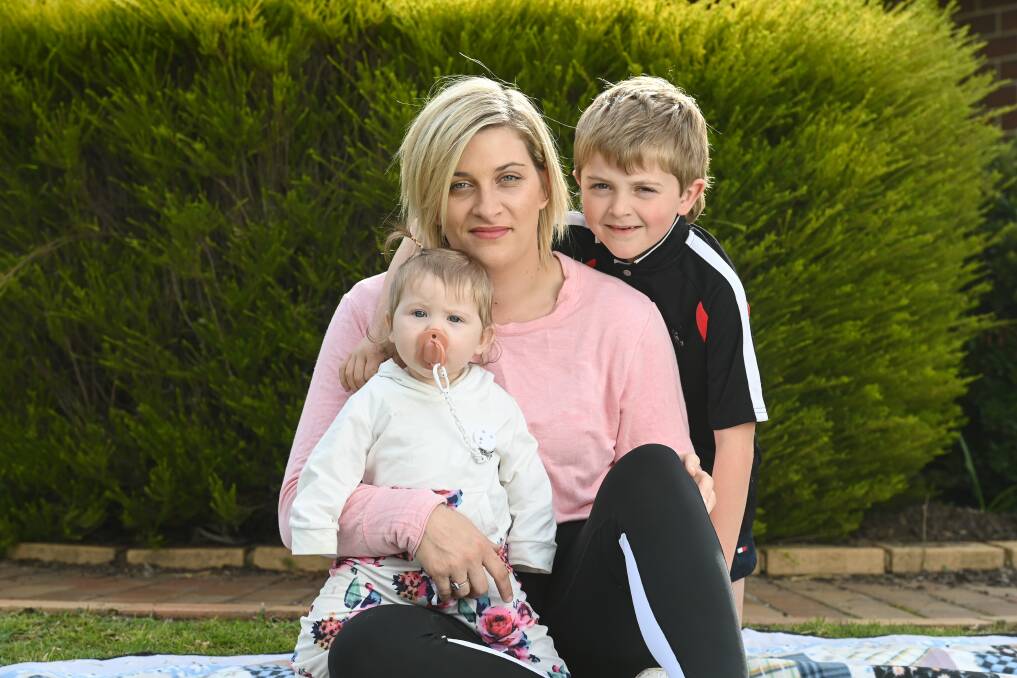 NEW CHAPTER: Restart Albury Wodonga co-ordinator Tara Fellowes, pictured with two of her children, Nelly, seven months, and Tommy, 7, is grateful for her experiences with the Border charity since 2016. Picture: MARK JESSER