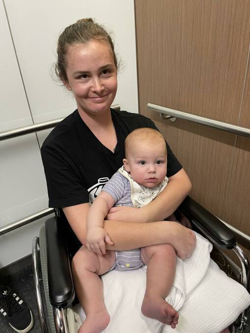 Albury hospitality worker and mother-of-two Mikaela Craven, 27, with baby Lonnie, is in Melbourne battling a rare brain syndrome, diagnosed early this year.