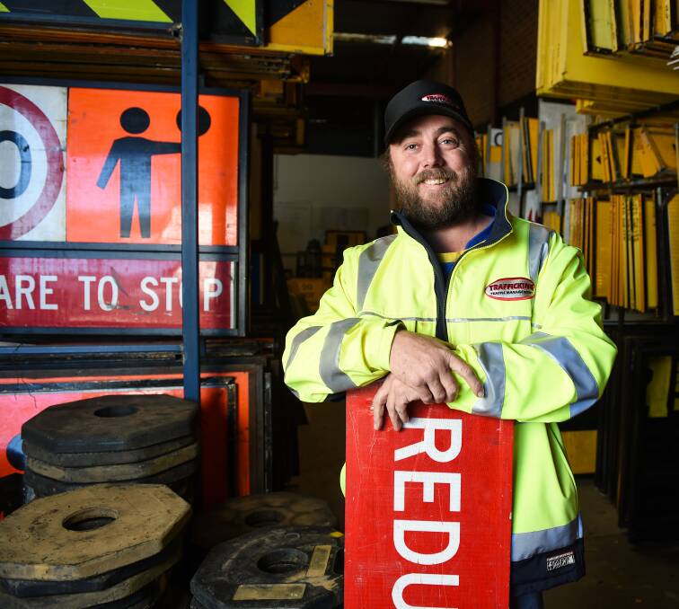 SIGNED AND SEALED: A former chef turned welder, Rod Thomas is back in full-time work with Trafficking Traffic Management in South Albury after suffering a workplace injury about four years ago. Picture: MARK JESSER