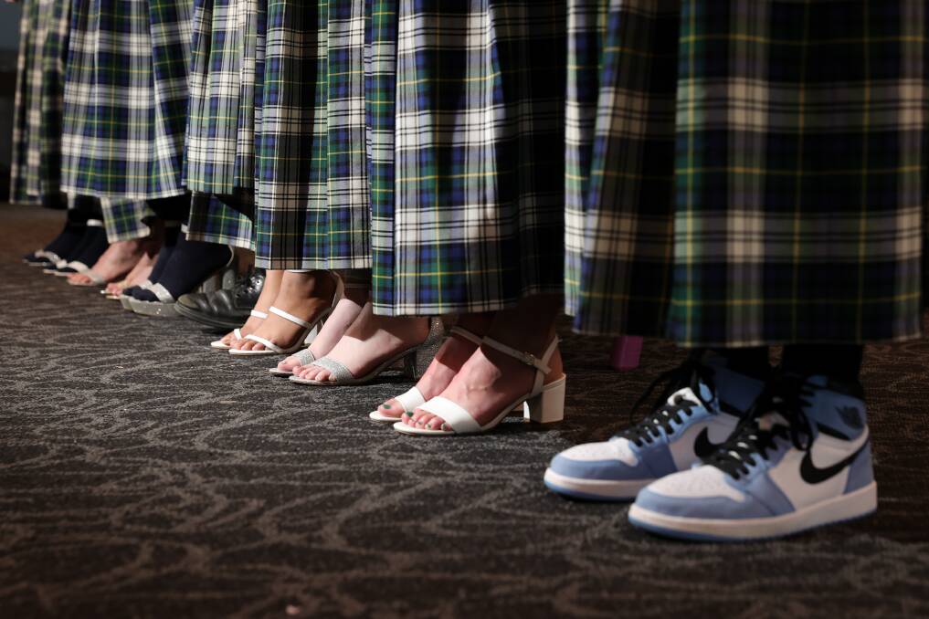 FANCY FOOTWORK: St Paul's College Walla Year 12 students line up for debutante training with Albury dance teacher Glen Strauss once a week over 10 weeks. Pictures: JAMES WILTSHIRE
