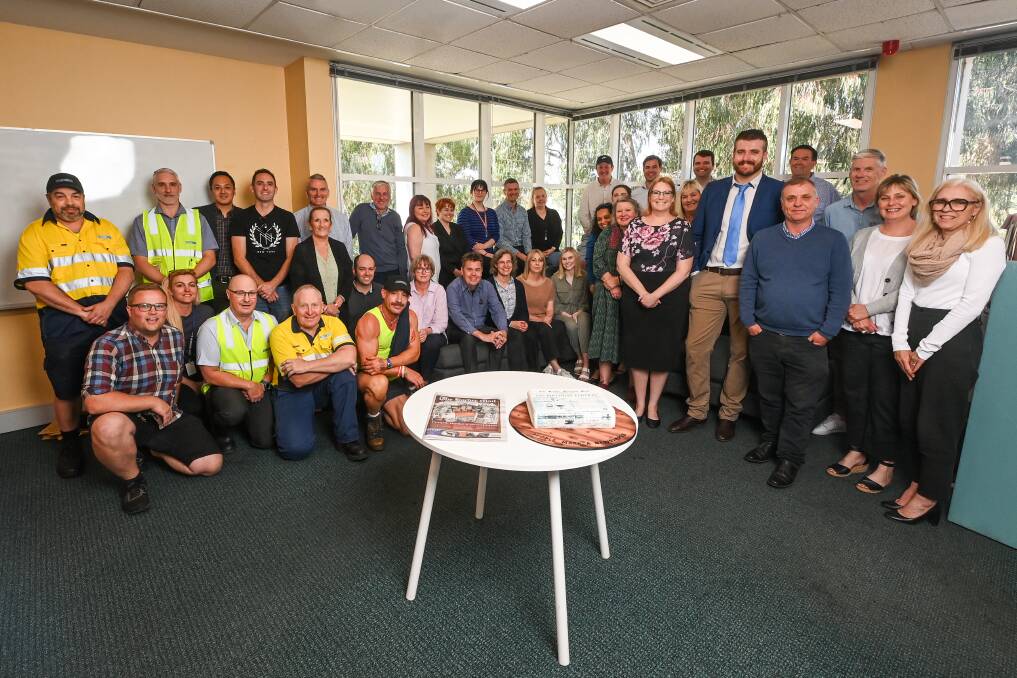 About 40 people celebrate the 120th anniversary of The Border Mail with a staff morning tea on Tuesday. Picture by Mark Jesser