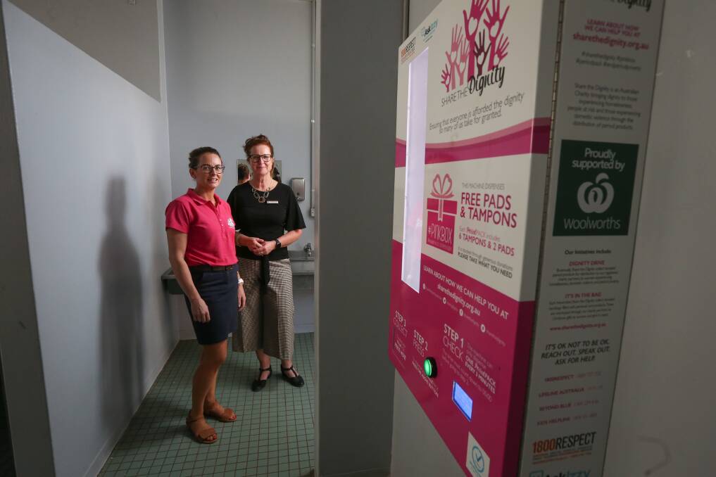 FREE SERVICE: Share The Dignity volunteer Rebecca O'Brien and James Fallon High School principal Jenny Parrett welcome the installation of a Dignity Vending Machine for school students. Picture: JAMES WILTSHIRE