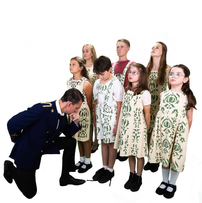 Trevor Vaughan as The Captain with the von Trapp children in Albury Wodonga Theatre Company's adaptation of The Sound of Music. Picture supplied