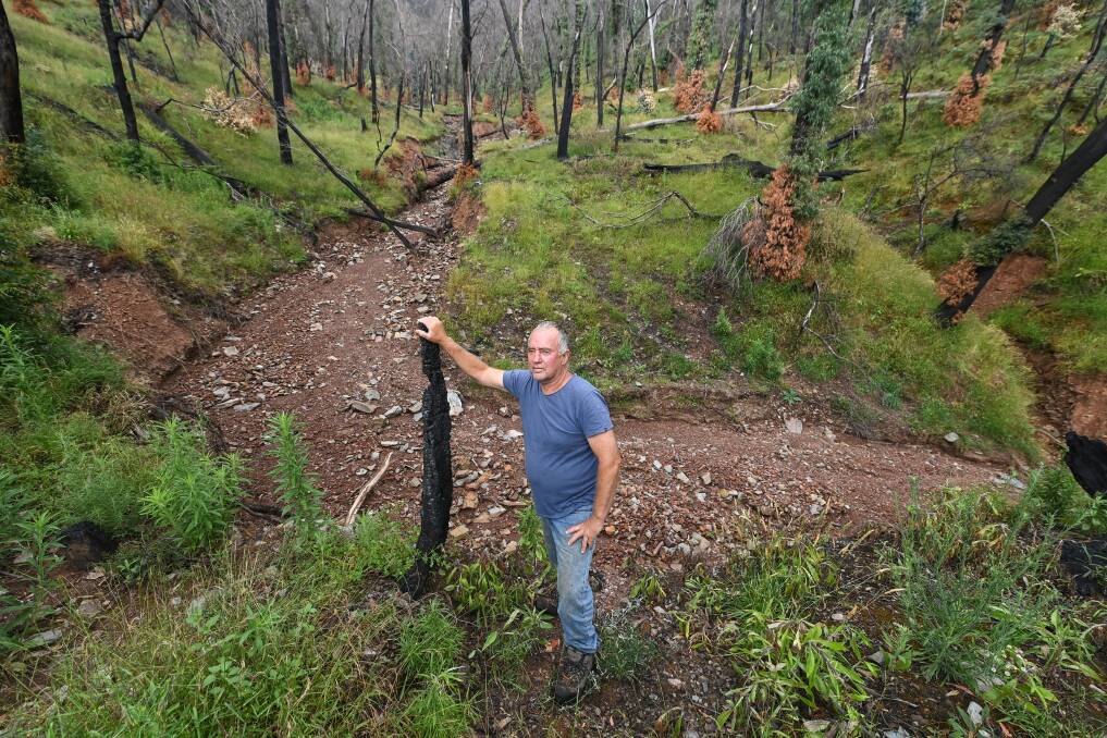 BATTLE: Biggara farmer Greg Wild says Upper Murray landholders contending with landslides can hardly get on track to rebuild their lives and livelihoods. Pictures: MARK JESSER