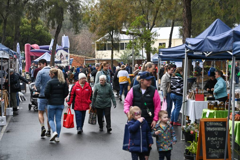 MARKET FORCES: More than 2000 people attended Albury Wodonga Farmers Market, which celebrated its 20th anniversary in Wodonga on Saturday. Pictures: MARK JESSER