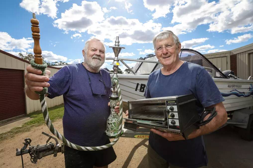 Neighbours Barry Dixon and John Waters are ready for the 25th annual Jindera Community Garage Sale on Sunday, April 14. Picture by James Wiltshire