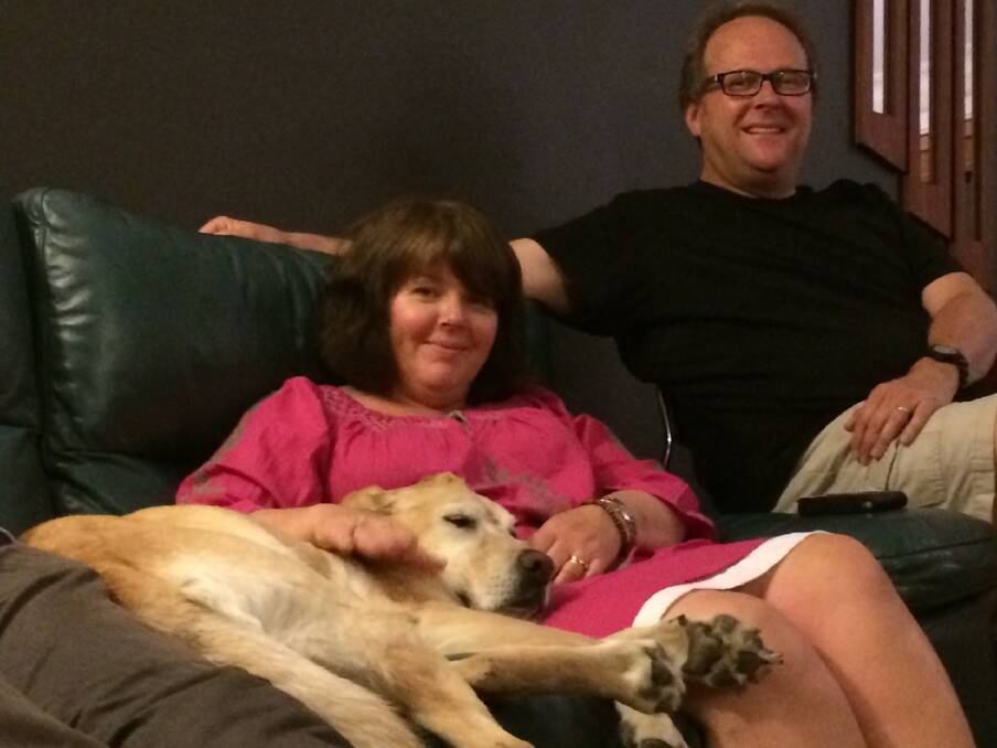 Nanette and David Hoysted with their Labrador Hester in West Albury in December 2013, just eight months before Nan's life-threatening brain haemorrhage. 