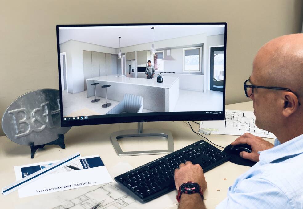 IMMERSIVE: B&H Homes architectural designer Andrew Ward shows off a 3D design video that gives clients an in-depth look at their new home design.