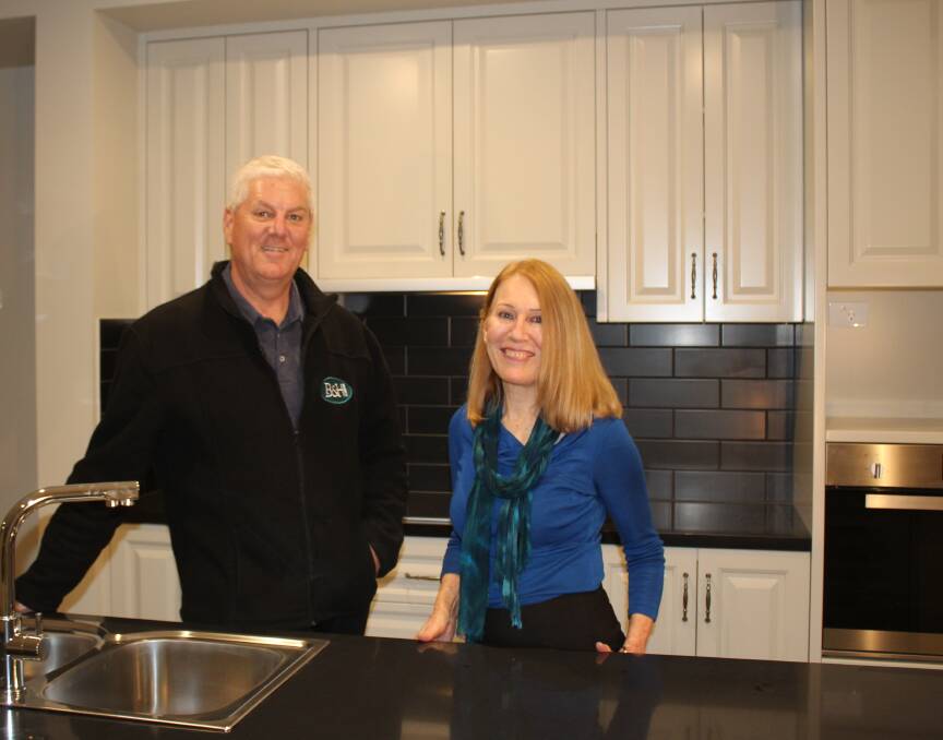 ANTICIPATION: Excited owner Brenda Davis (right), with B&H Homes John Dempsey, is ready to move in.