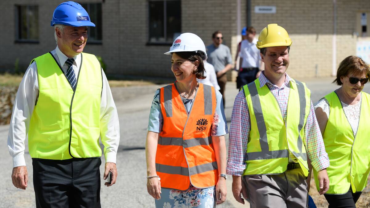 HARD HATS ON: Albury MP Greg Alpin, Premier Gladys Berejiklian and new candidate Justin Clancy also toured construction work at the brain and mind centre.
