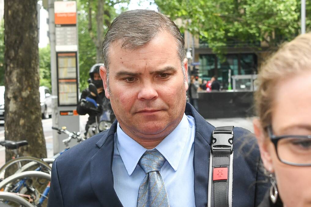 DENIAL OF CHARGES: Myrtleford's Leading Senior Constable David Jenkin at Melbourne County Court on Thursday, where he is facing trial.