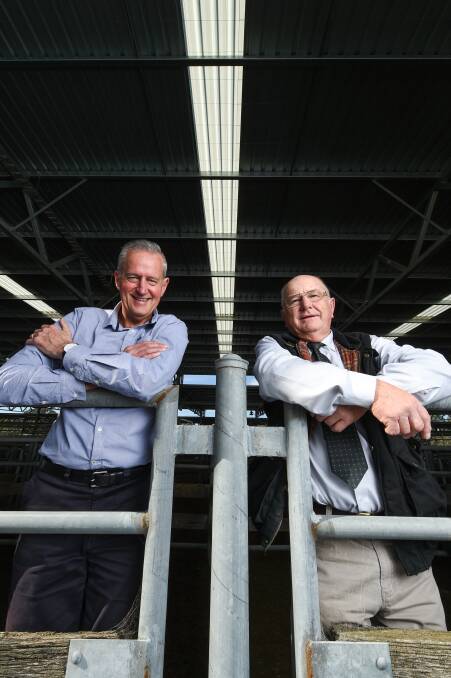RENEWABLE INITIATIVES: Countrywide Energy director Geoff Drucker and Wangaratta councillor Harvey Benton at the announcement of solar panels for the saleyards roof.
