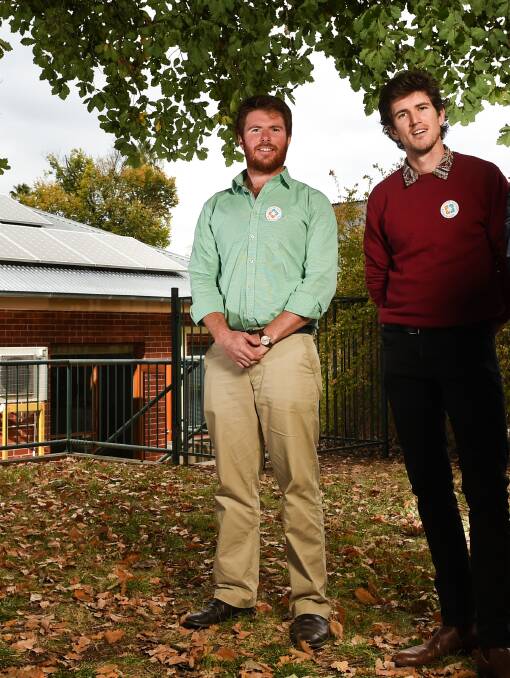 EXCITING TIMES: Totally Renewable Yackandandah's Matthew Charles-Jones and Ben McGowan say a mini-grid trial would build on the town's work to install solar panels.