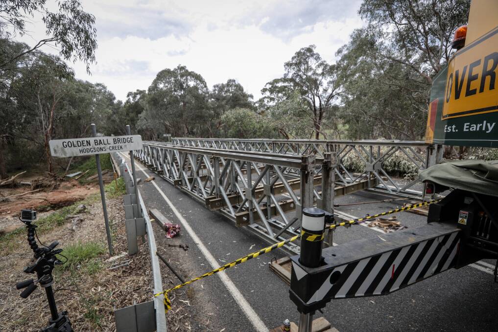 ROAD TO REOPENING: Regional Roads Victoria has described the temporary bridge as looking "like a big Meccano set". Pictures: JAMES WILTSHIRE