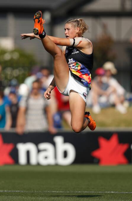 IN FULL FLIGHT: The photos of Carlton player Tayla Harris taken by AFL Media's Michael Willson that displayed her distinctive kicking style and athleticism.