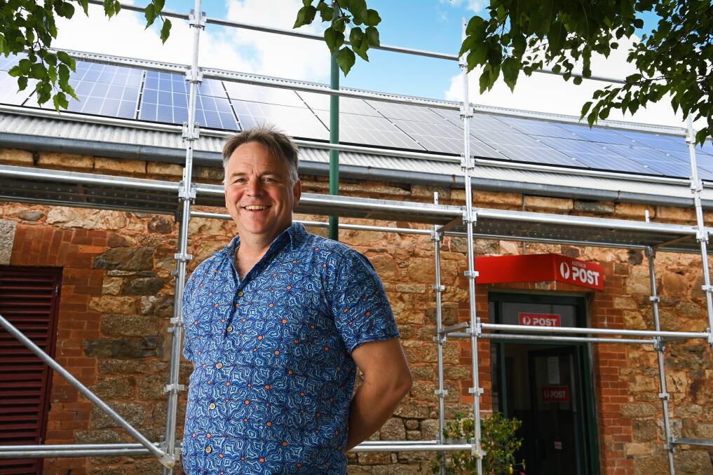 AWARD NOMINEE: As part of Totally Renewable Yackandandah, Matthew Charles-Jones has seen an increase in solar panels being used on homes and buildings in the town, including recently at the post office. Picture: MARK JESSER