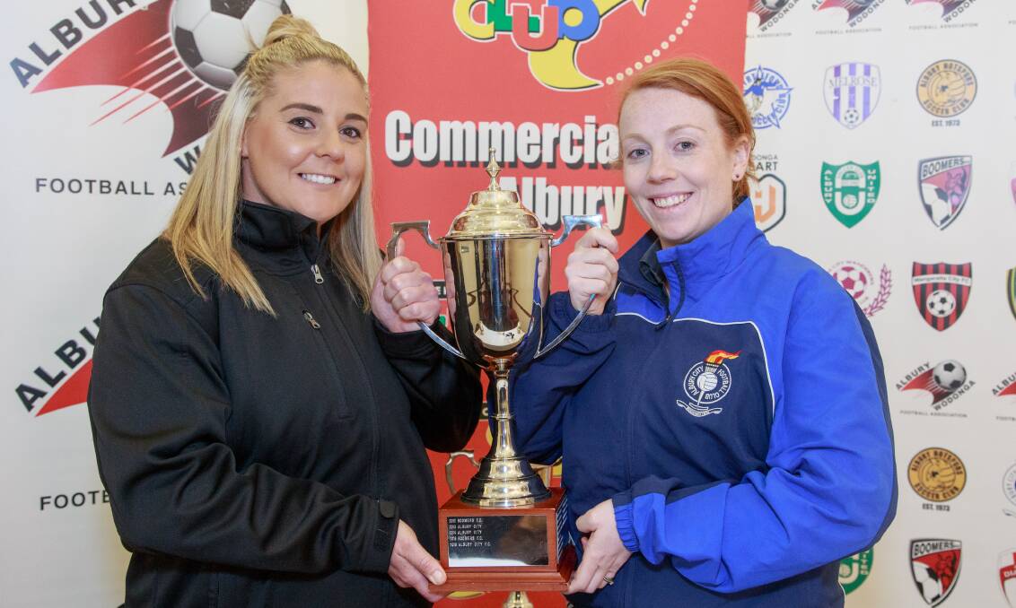 ULTIMATE GOAL: Boomers' Janae Abel and Albury City’s Brogan Broadway will be hoping to get their hands on the women's cup on Sunday after what promises to be a hard-fought final. Picture: SIMON BAYLISS
